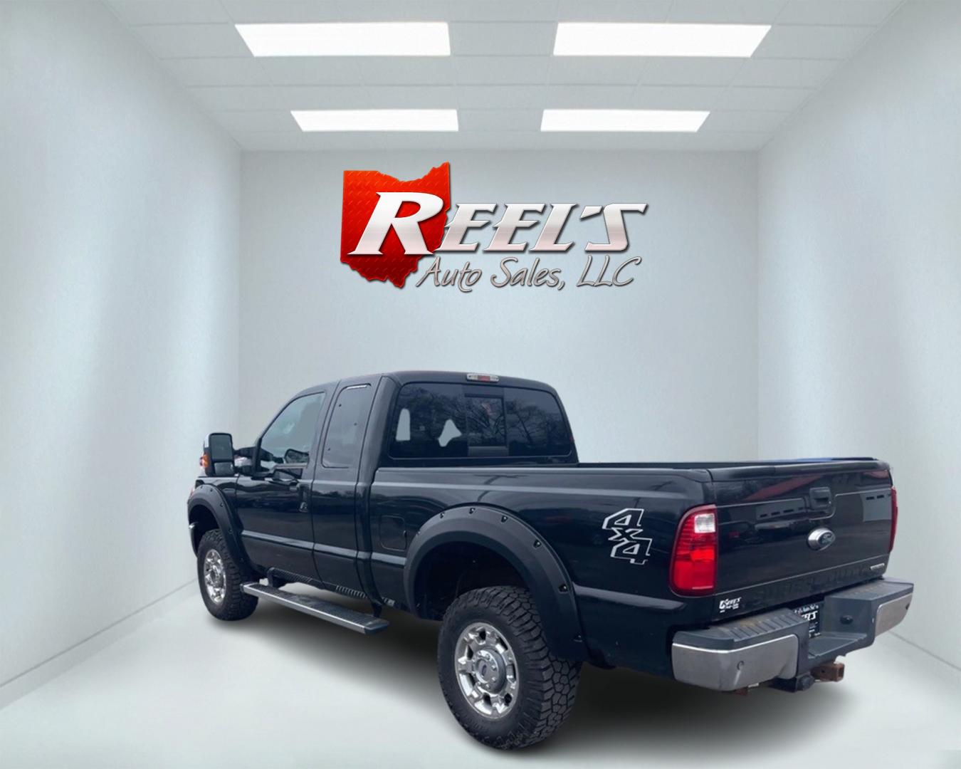 2015 Black /Black Ford F-250 SD Lariat SuperCab Long Bed 4WD (1FT7X2B63FE) with an 6.2L V8 OHV 16V FFV engine, 6-Speed Automatic transmission, located at 547 E. Main St., Orwell, OH, 44076, (440) 437-5893, 41.535435, -80.847855 - Photo#7